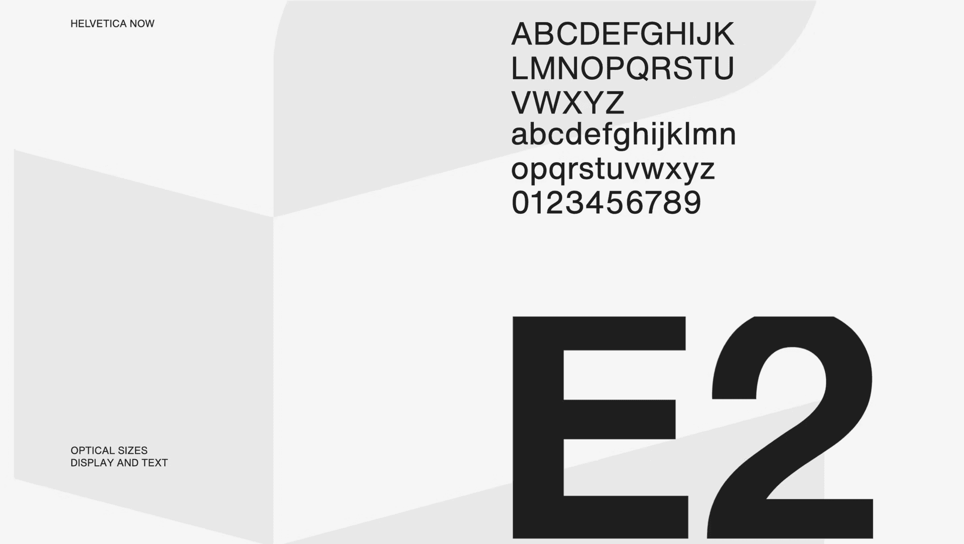 Typography reference — Helvetica Now used across optical sizes for display and text, with a large E2 specimen
